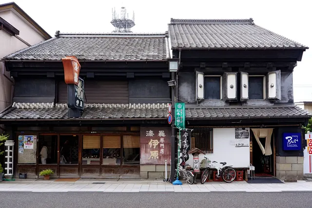 Black-and-white storehouses along Nakamachi Street